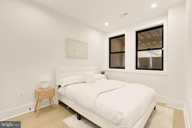 bedroom featuring light hardwood / wood-style floors