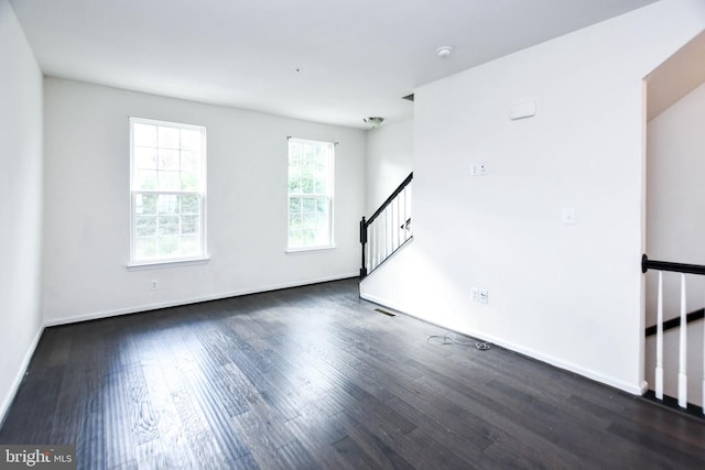 5608 Glover Park Dr, Upper Marlboro, MD 20772 - empty room featuring wood finished floors, baseboards, and stairway