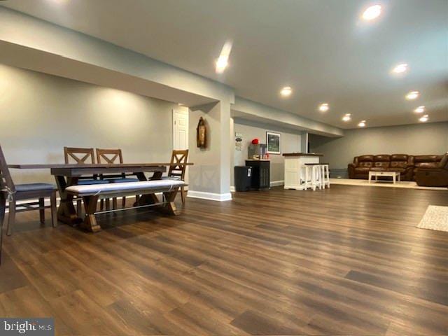 dining space featuring dark hardwood / wood-style floors