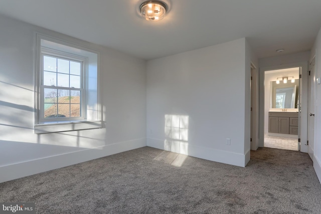 spare room with carpet flooring