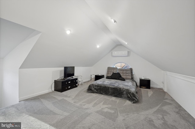 carpeted bedroom with lofted ceiling