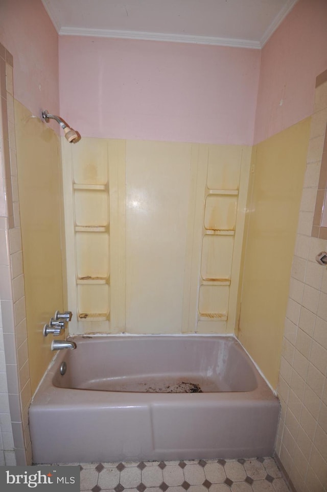 bathroom featuring ornamental molding and shower / tub combination