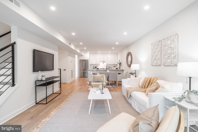 living room with light wood-type flooring