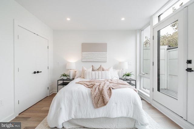 bedroom featuring light hardwood / wood-style floors