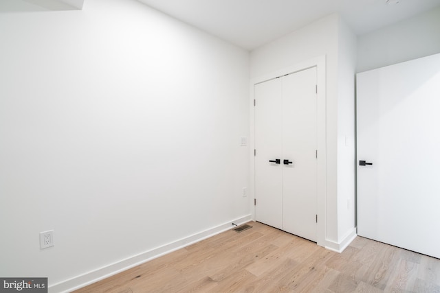 washroom featuring light hardwood / wood-style floors