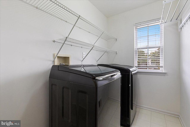 washroom featuring separate washer and dryer