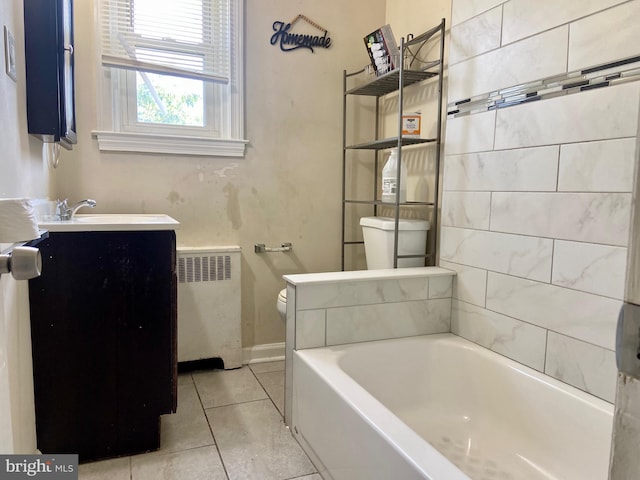 bathroom featuring tile patterned floors, radiator heating unit, vanity, and toilet