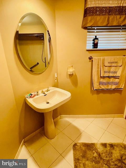 bathroom featuring tile patterned flooring