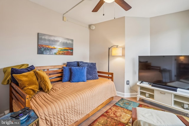 bedroom featuring ceiling fan and wood-type flooring