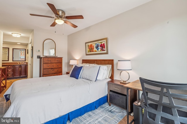 bedroom featuring hardwood / wood-style floors and ceiling fan