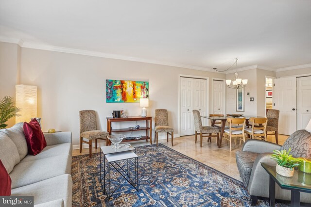 living room with a chandelier and ornamental molding