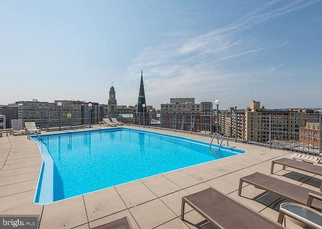 1239 Vermont Ave NW Unit 602, Washington, DC 20005 - community pool featuring a city view and a patio