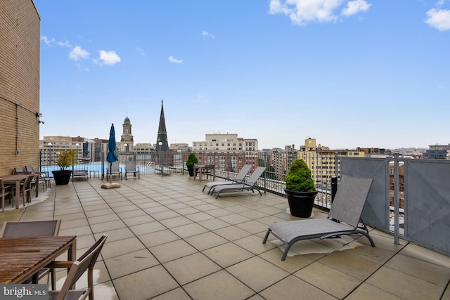 view of patio / terrace with a water view