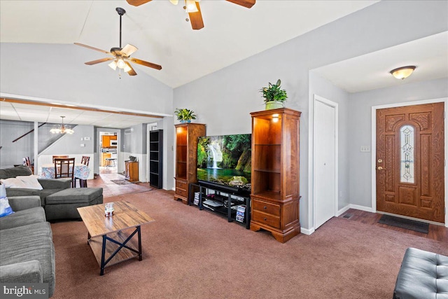 living room featuring ceiling fan with notable chandelier, carpet floors, and lofted ceiling