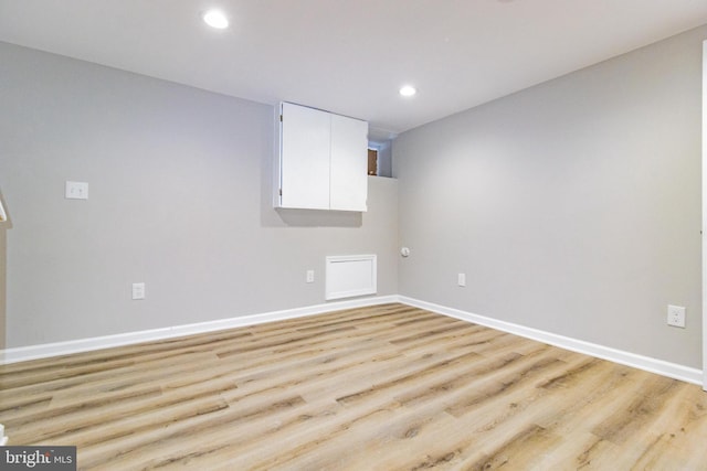 unfurnished room featuring light wood-type flooring