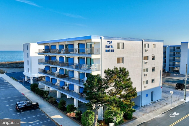 view of building exterior featuring a water view