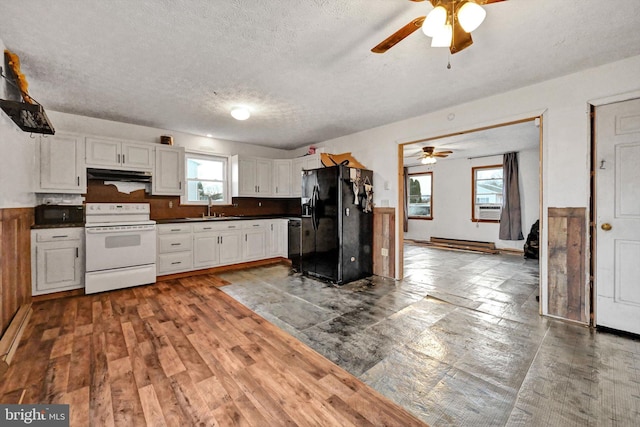 kitchen with black appliances, white cabinets, sink, a textured ceiling, and dark hardwood / wood-style flooring