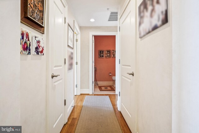 hall featuring light hardwood / wood-style floors