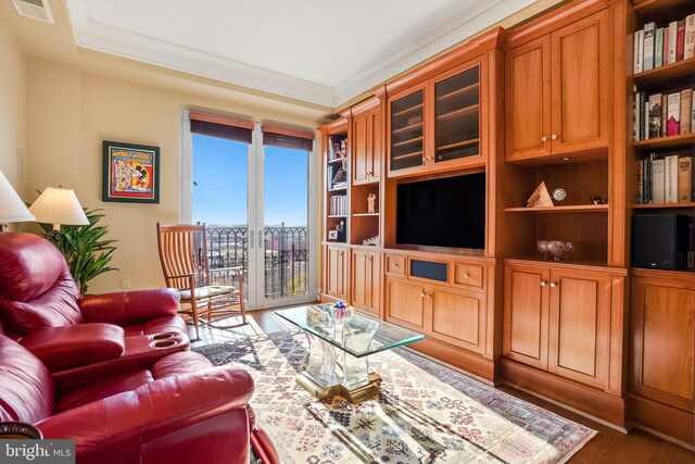 living room with french doors, dark hardwood / wood-style flooring, and ornamental molding