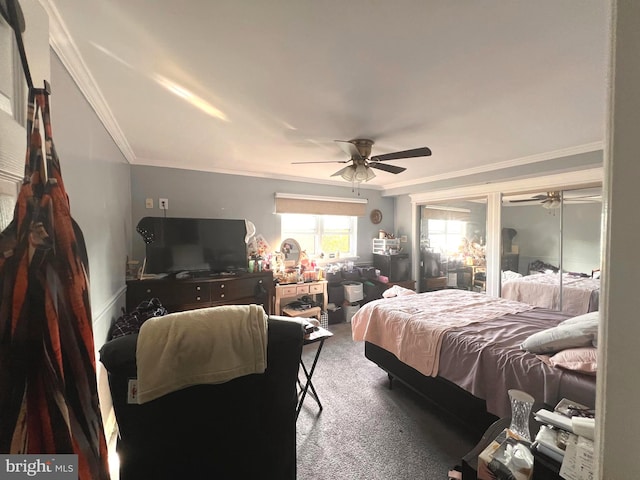 bedroom featuring ceiling fan, crown molding, and carpet