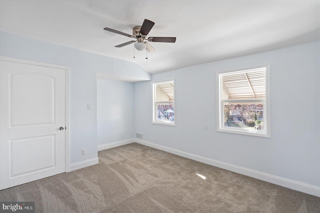 carpeted empty room with ceiling fan