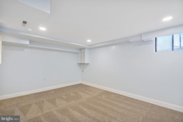 basement featuring carpet