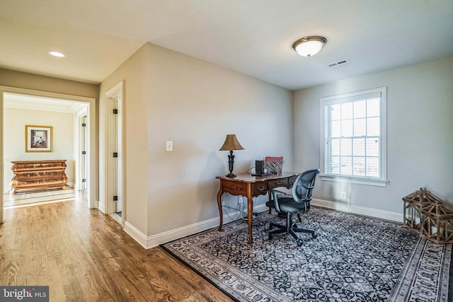 office with hardwood / wood-style floors