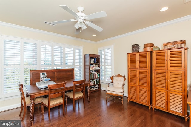 dining space featuring plenty of natural light, dark hardwood / wood-style floors, ornamental molding, and ceiling fan