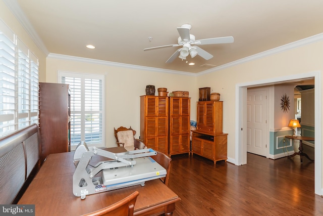 home office with dark hardwood / wood-style floors, ceiling fan, and ornamental molding