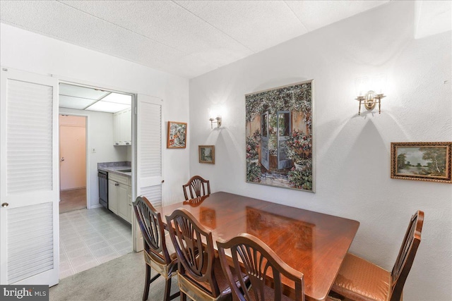 dining area with light tile patterned floors