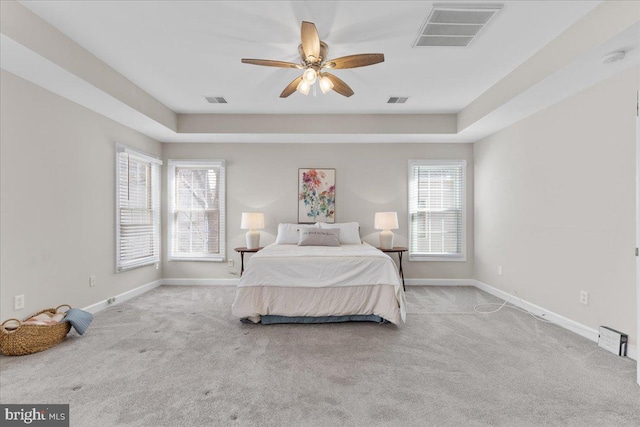 bedroom featuring visible vents, carpet flooring, and baseboards