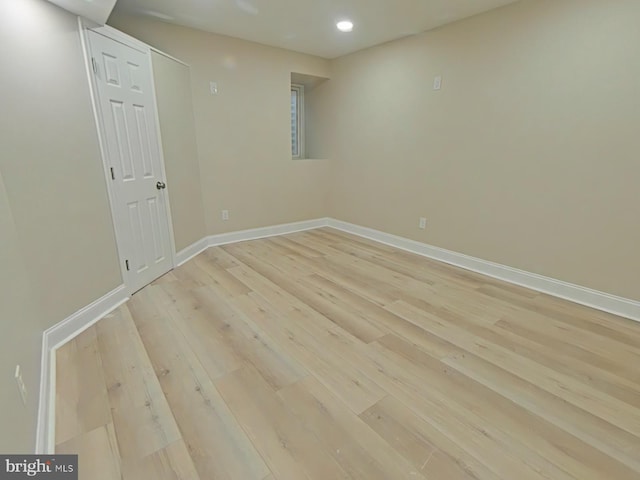 spare room featuring light wood-type flooring