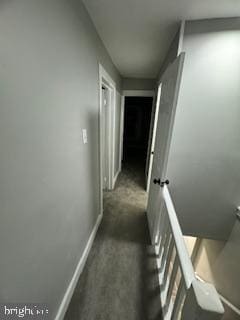 217 S 4th St, Vineland, NJ 08360 - corridor featuring dark carpet and baseboards