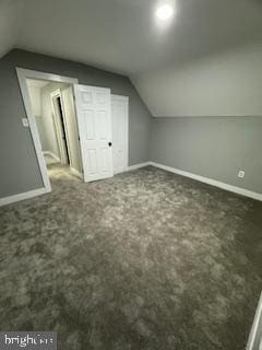 217 S 4th St, Vineland, NJ 08360 - bonus room featuring lofted ceiling, baseboards, and carpet