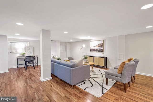 living room with light hardwood / wood-style floors