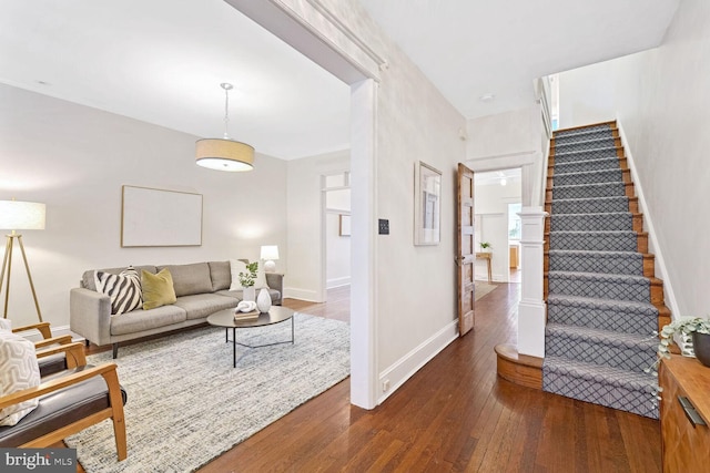 living room with dark wood-type flooring