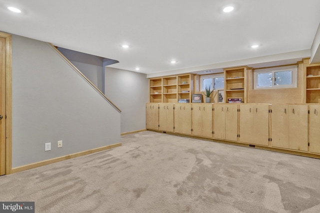 basement with light colored carpet