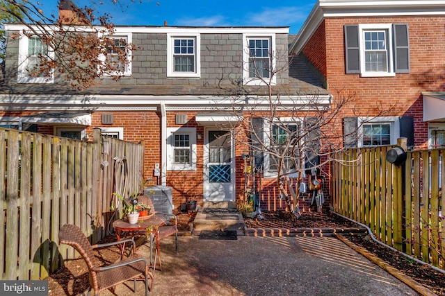 back of house featuring a patio