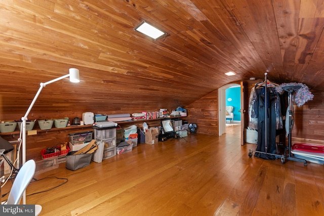 bonus room with hardwood / wood-style flooring, wood ceiling, and vaulted ceiling