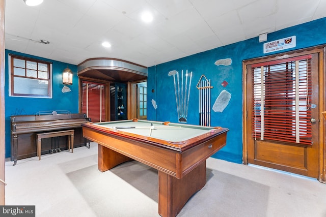 recreation room with light carpet and billiards