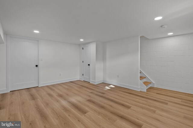 basement with light wood-type flooring