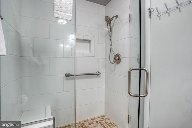 bathroom featuring walk in shower