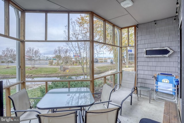 sunroom / solarium featuring a wealth of natural light