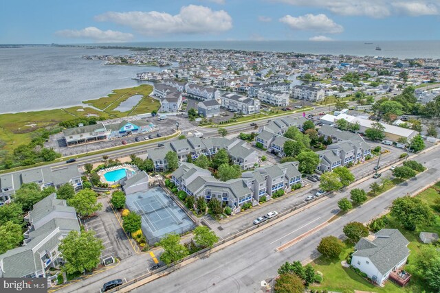 birds eye view of property featuring a water view