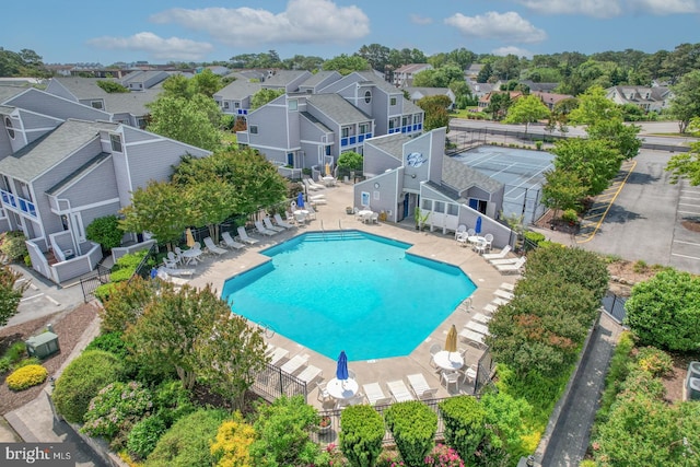 view of swimming pool with a patio