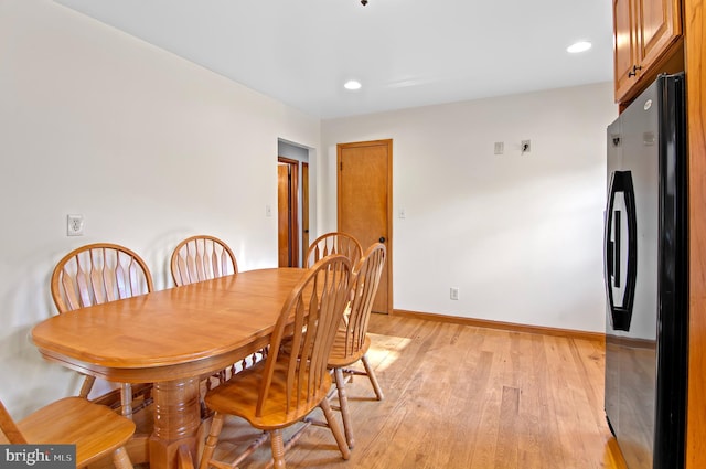 dining area featuring light hardwood / wood-style floors