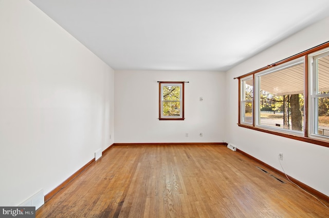 empty room featuring light hardwood / wood-style floors