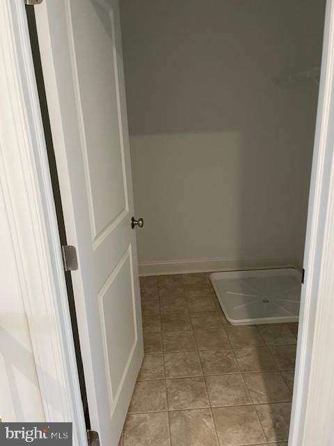 bathroom with tile patterned flooring