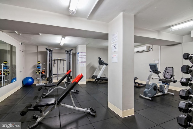 workout area featuring a wall mounted AC