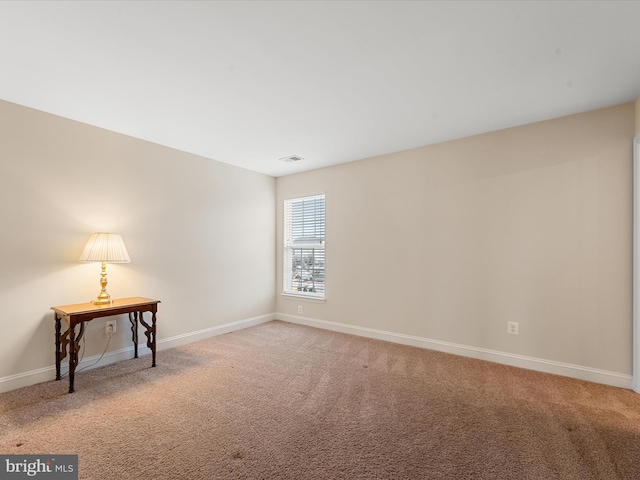 view of carpeted spare room